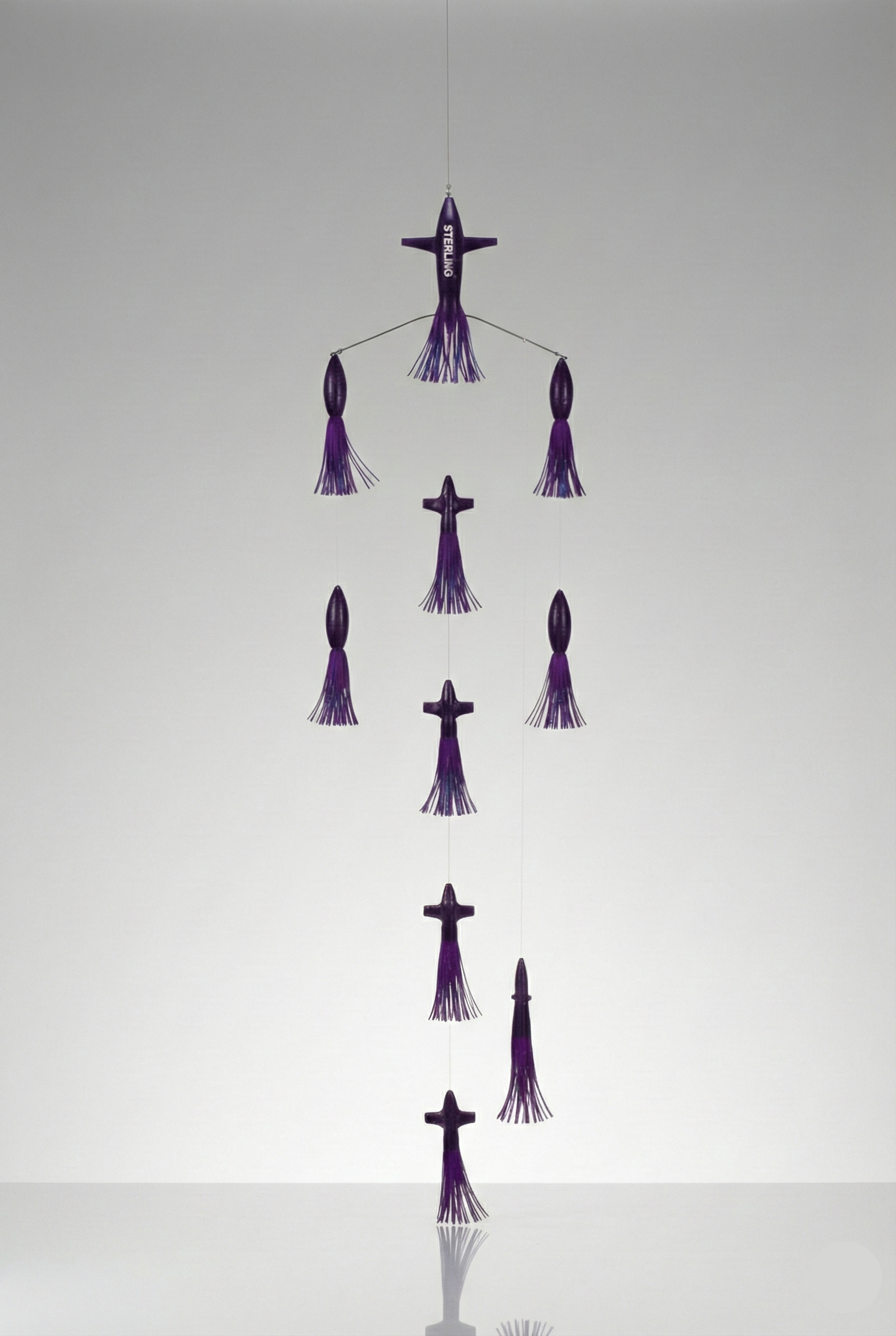 Señuelo de pesca profesional para superficie Rastreador del Caos Púrpura, diseñado para grandes capturas.